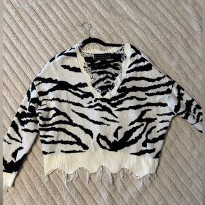 Cropped distressed sweater